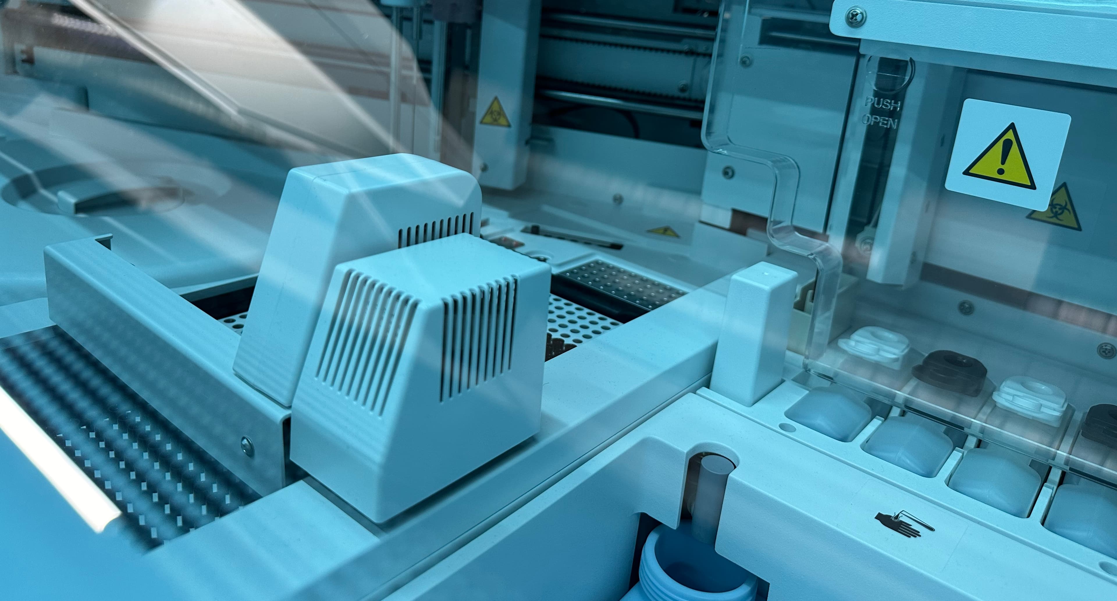 Lab analyzer with biohazard safety controls in our processing area